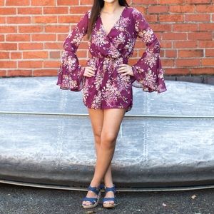 Floral romper from clothing brand Miami (purchased from Francesca's). Size small